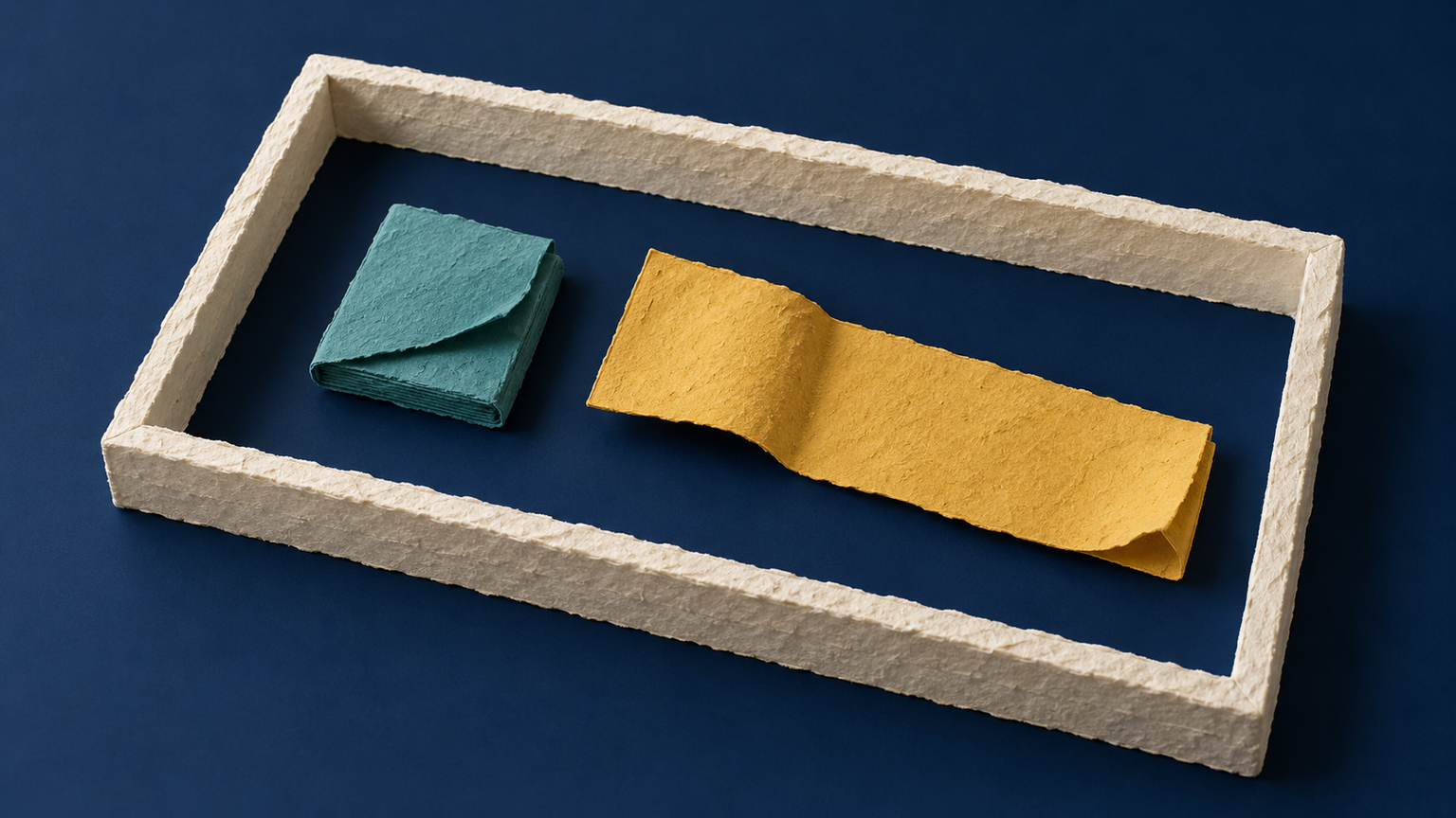 Original conceptual paper composition: one enclosing frame contains two distinct pieces, representing a whole and its parts, not a geographic map